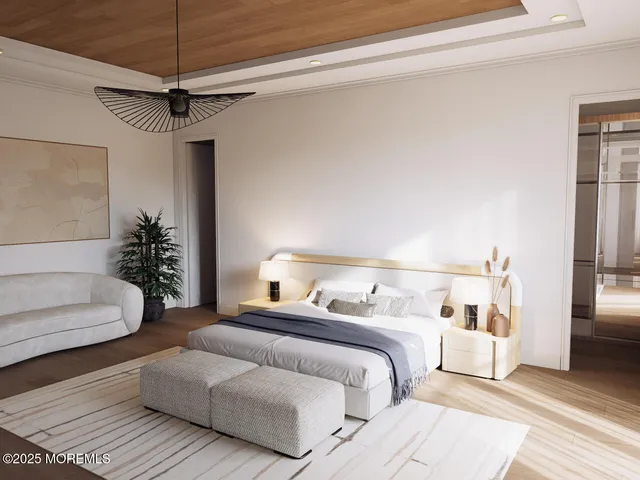 a bedroom with a large bed and a couch