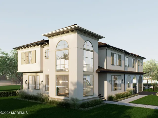 a view of a big house with a yard and plants
