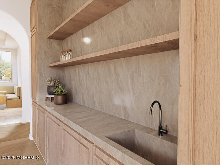 186 Whalepond Road Eatontown, NJ 07724 - Photo 24 of 28 a kitchen with a sink and a refrigerator
