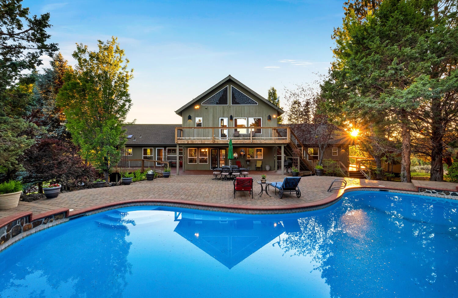 60470 Arnold Market Road Bend, OR 97702 - Photo 30 of 53 pool-home twilight