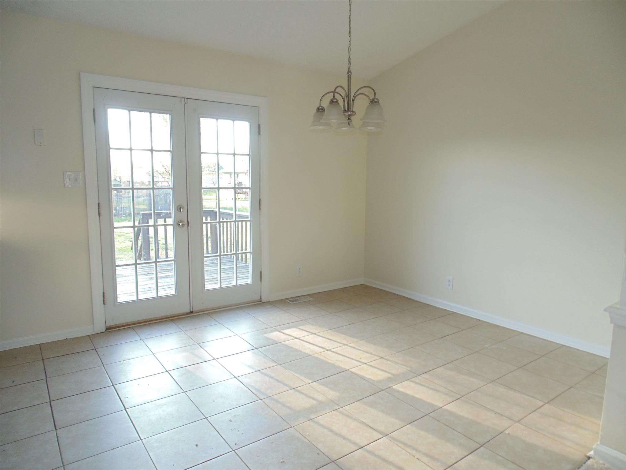 8671 Pembroke Oak Grove Road Oak Grove, KY 42262 - Photo 5 of 11 a view of an empty room with a window