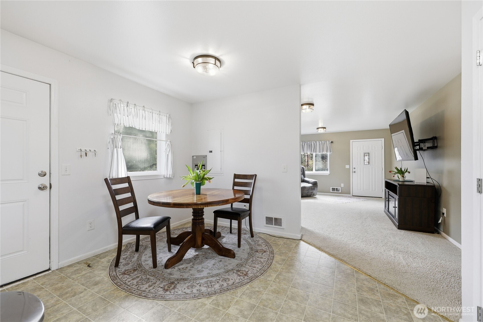 331 Bachelor Road Sequim, WA 98382 - Photo 11 of 36 a view of a dining room with furniture