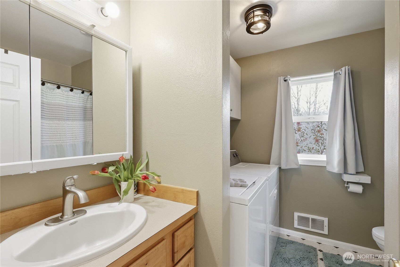 331 Bachelor Road Sequim, WA 98382 - Photo 17 of 36 a bathroom with a sink double vanity and a mirror