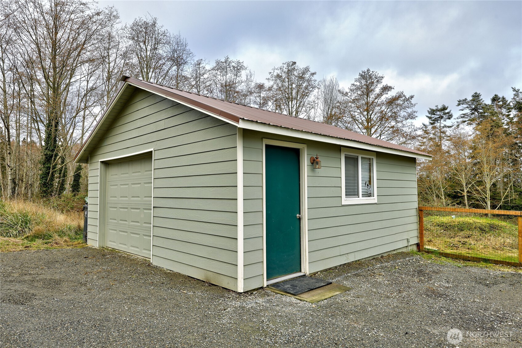 331 Bachelor Road Sequim, WA 98382 - Photo 24 of 36 a view of a house with a yard