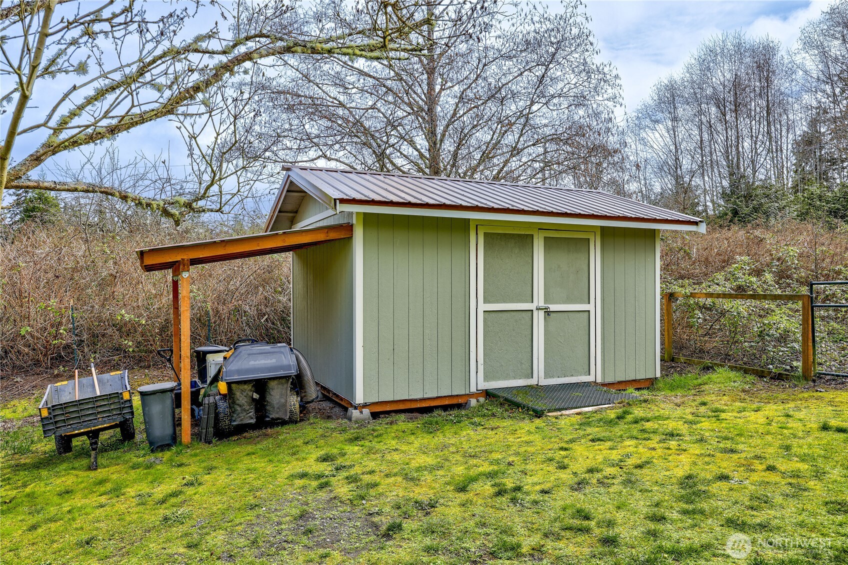 331 Bachelor Road Sequim, WA 98382 - Photo 25 of 36 a view of a house with a yard and sitting area