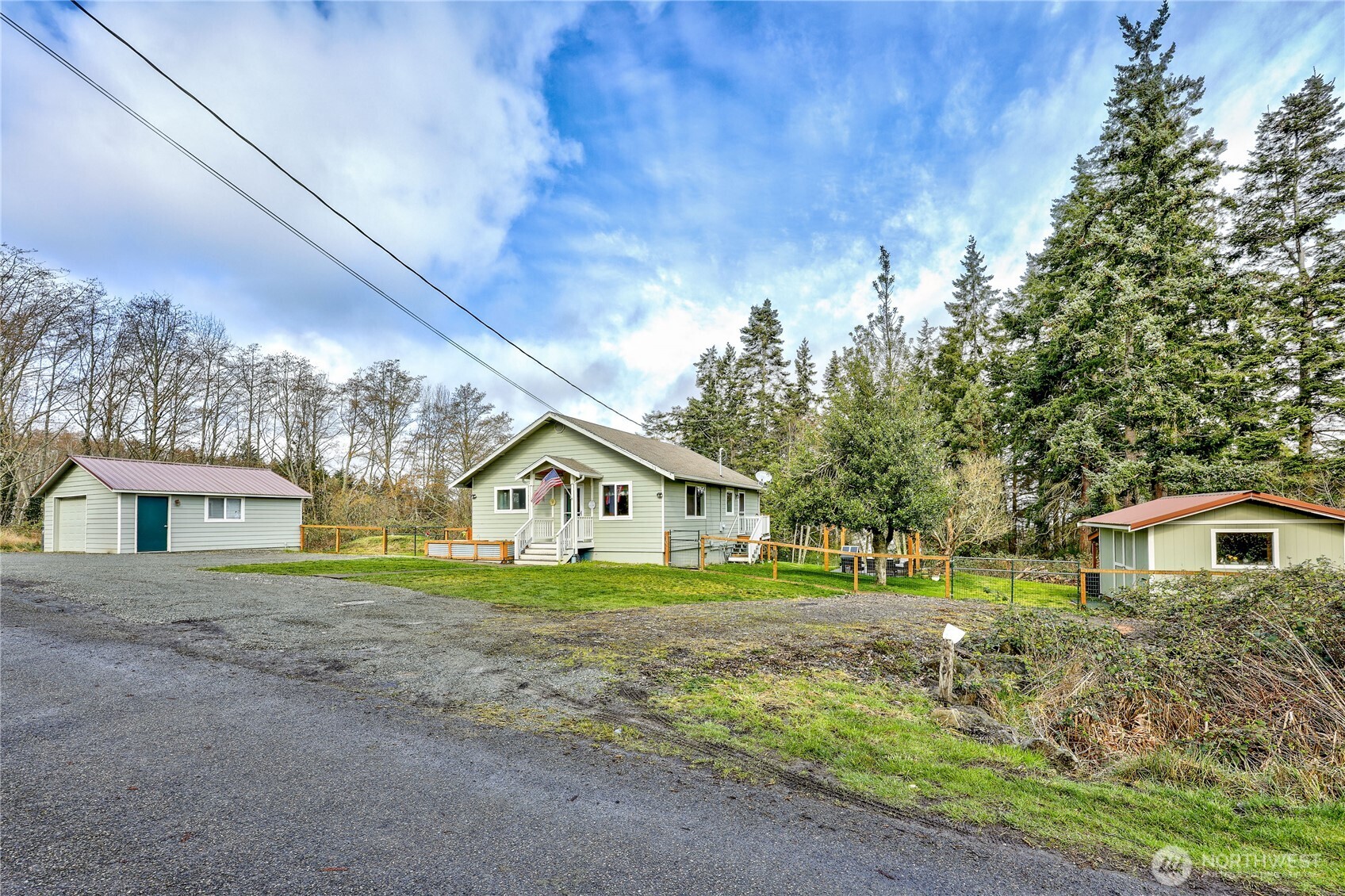 331 Bachelor Road Sequim, WA 98382 - Photo 31 of 36 a front view of a house with a yard