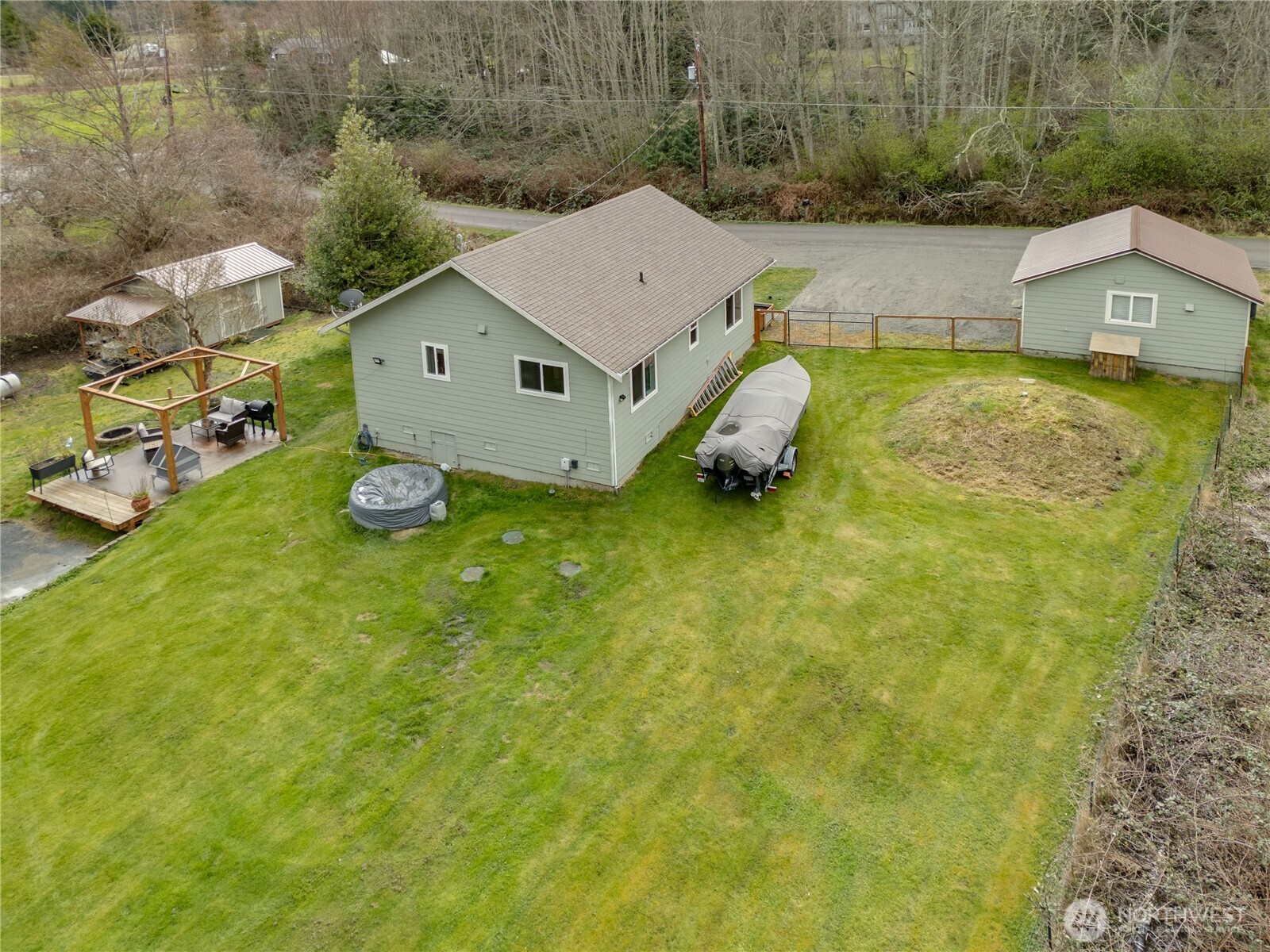 331 Bachelor Road Sequim, WA 98382 - Photo 35 of 36 an aerial view of residential houses with outdoor space and trees