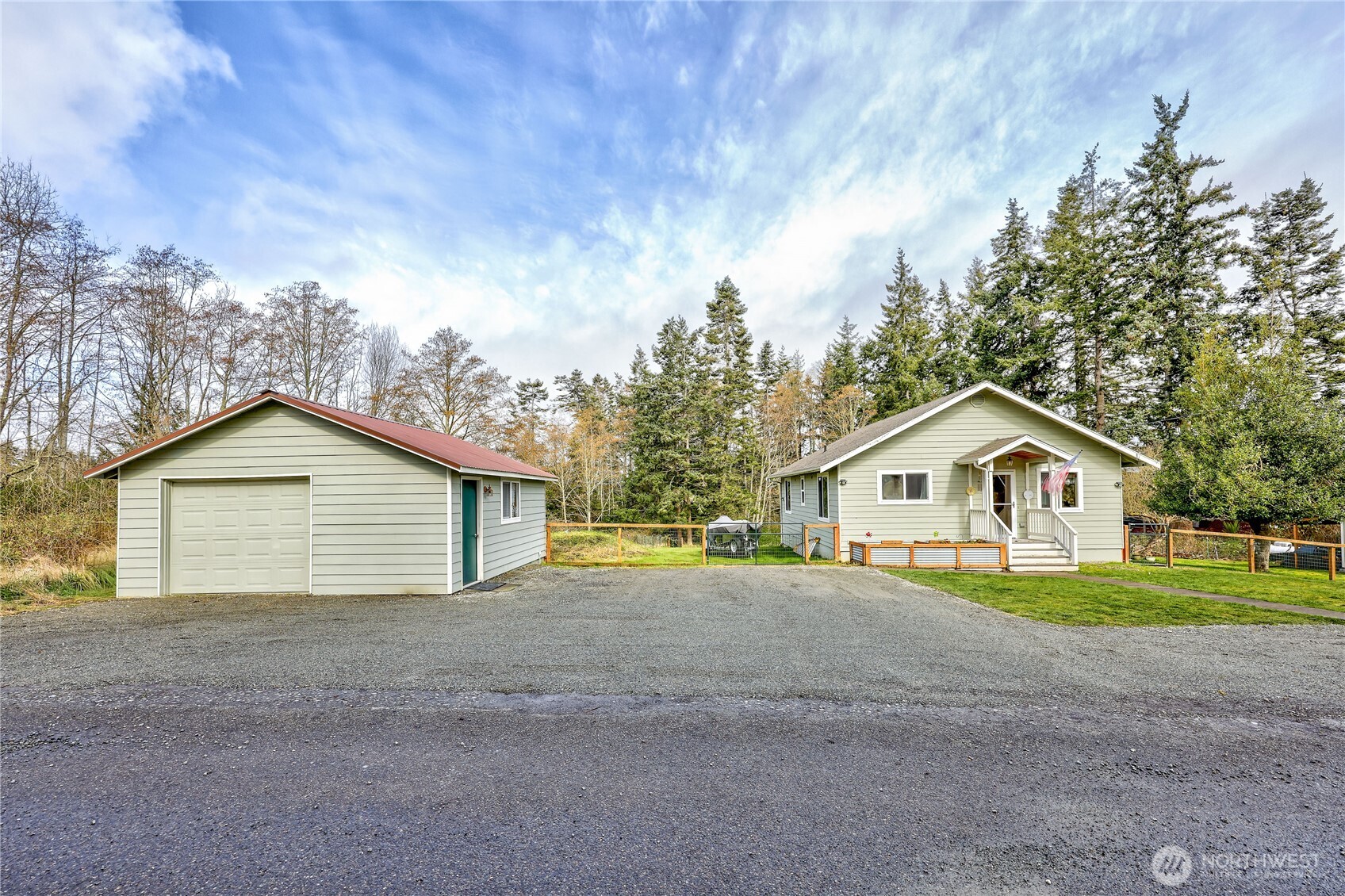 331 Bachelor Road Sequim, WA 98382 - Photo 36 of 36 a view of an house with a yard and large tree