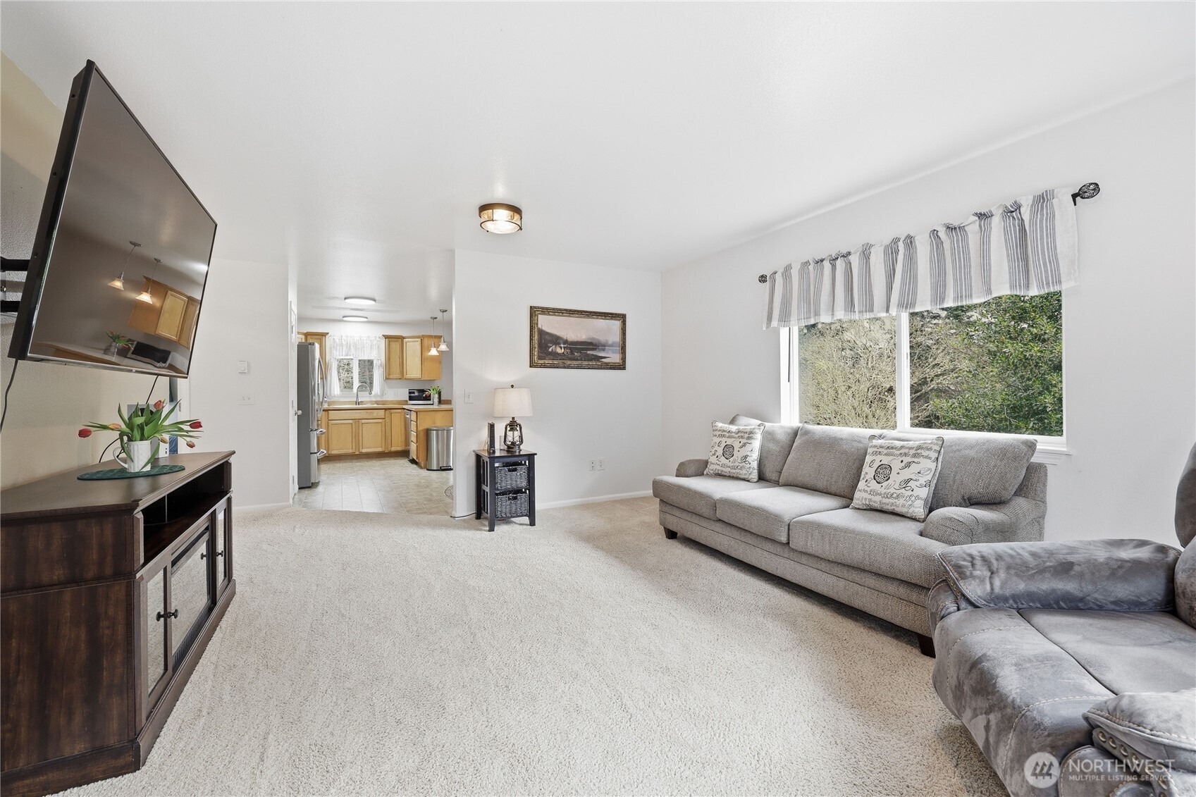 331 Bachelor Road Sequim, WA 98382 - Photo 4 of 36 a living room with furniture and a flat screen tv