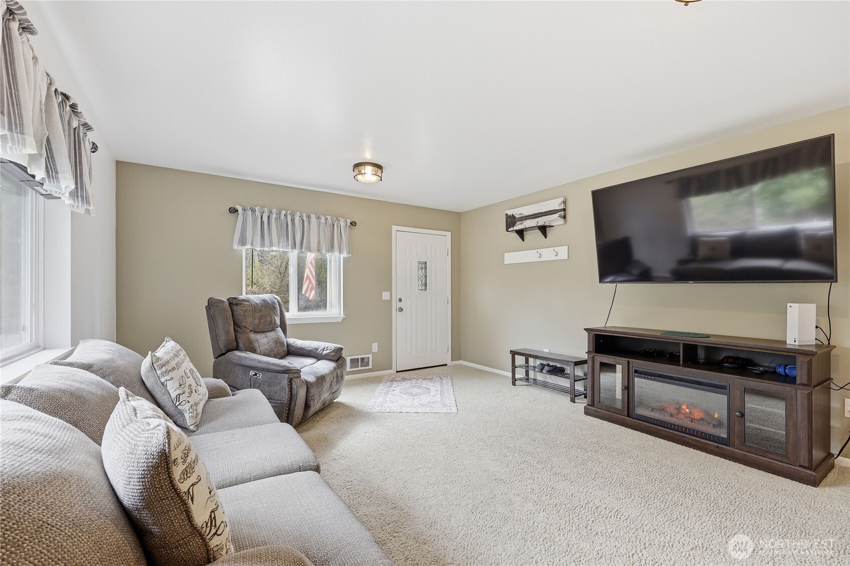 331 Bachelor Road Sequim, WA 98382 - Photo 5 of 36 a living room with furniture and a flat screen tv