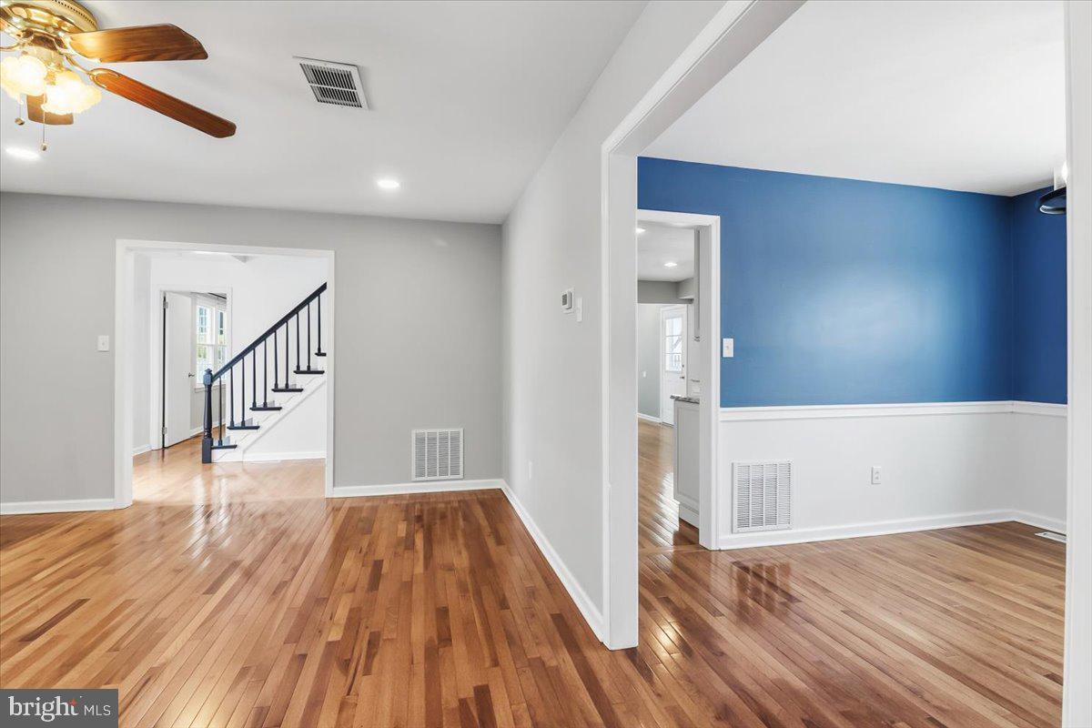 11 North Williamson Road Avondale, PA 19311 - Photo 7 of 36 a view of a hallway view with wooden floor and staircase