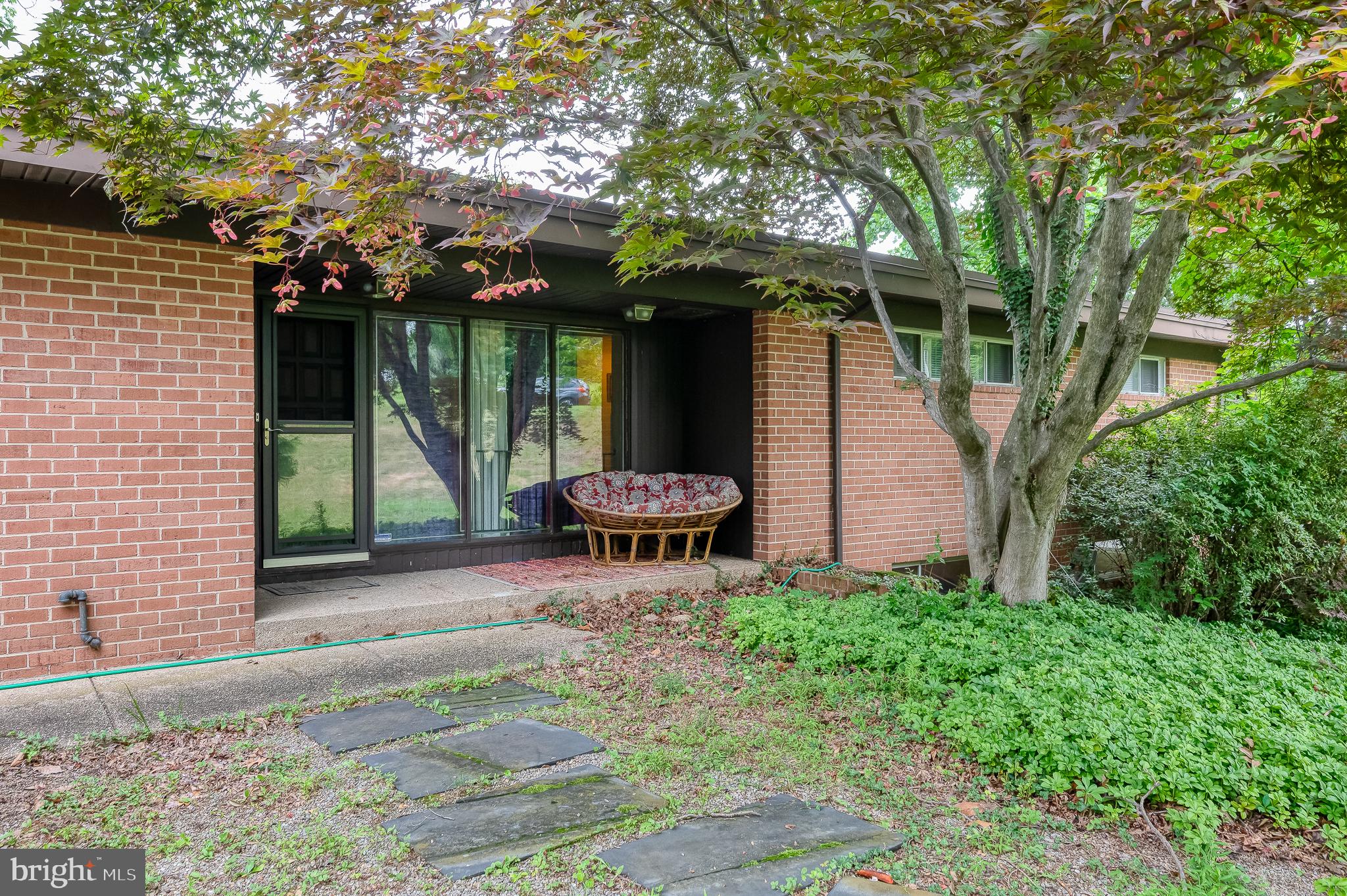 3228 Midfield Road Pikesville, MD 21208 - Photo 40 of 42 Charming entryway with lush greenery.