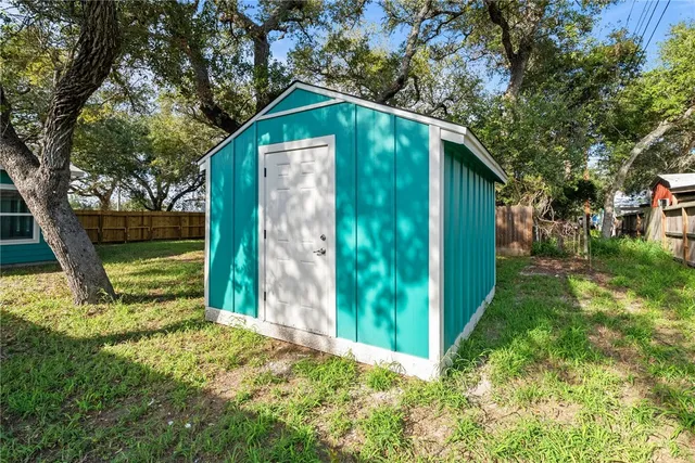 a backyard of a house with lots of green space