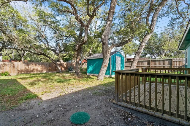 a view of a wooden floor with a trees