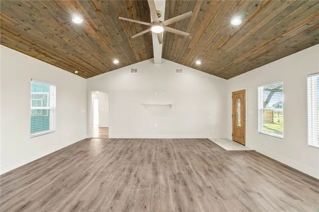 a view of an empty room and window