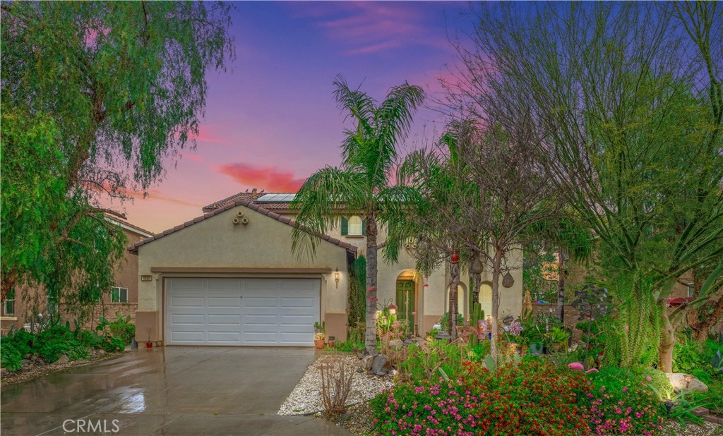 1520 Adderstone Way Perris, CA 92571 - Photo 1 of 1 a front view of a house with a yard