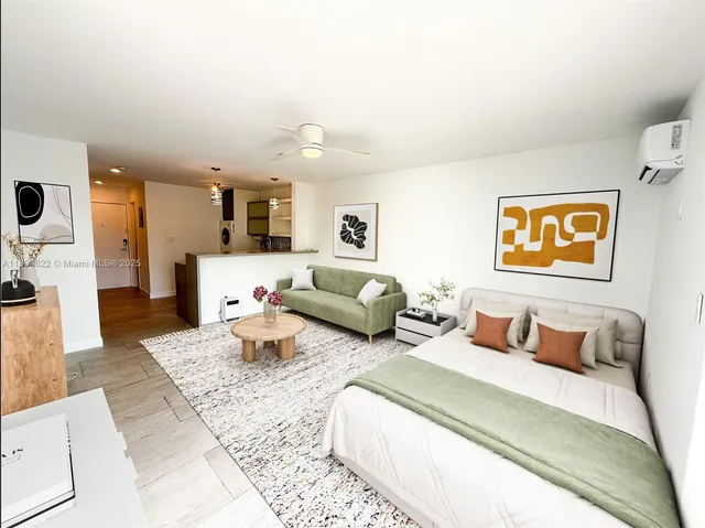 a bedroom with furniture and a couch