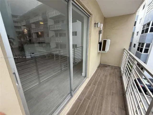 a view of a building with a tree