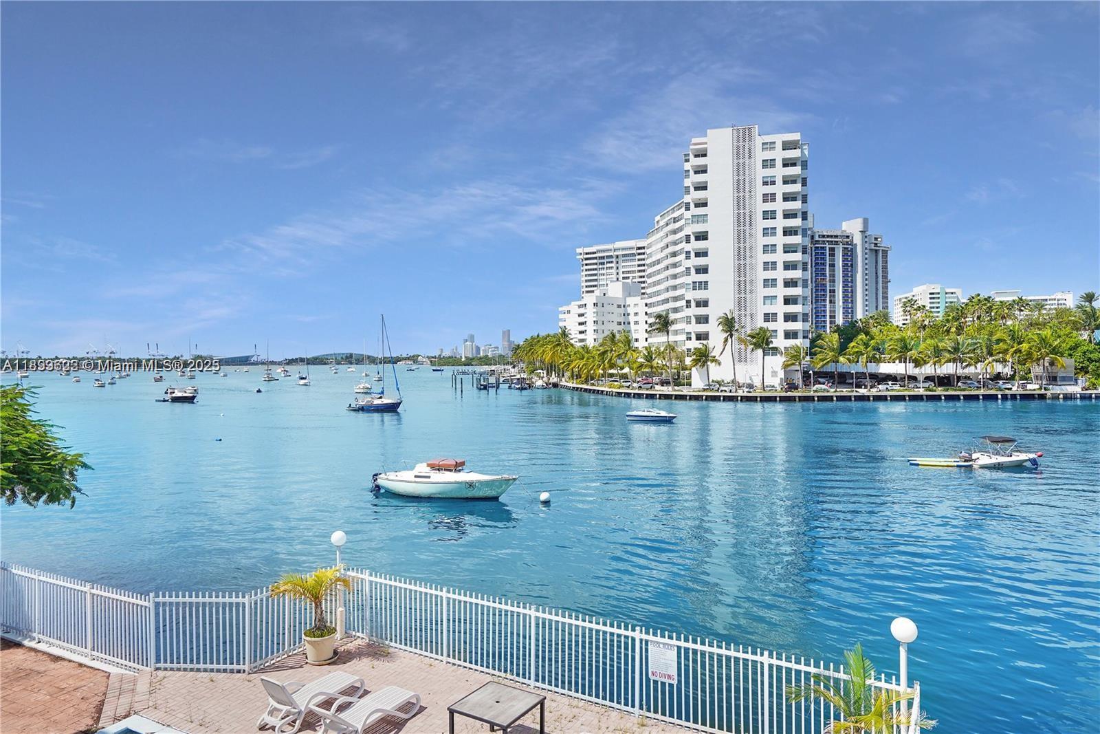 1441 Lincoln Road, Unit 317 Miami Beach, FL 33139 - Photo 28 of 31 a view of terrace with glass door and outdoor seating