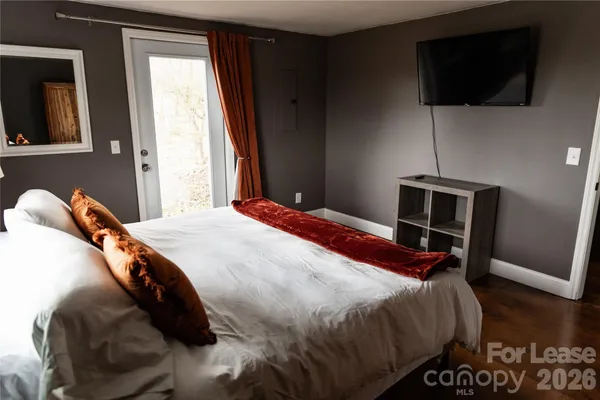 a bathroom with a granite countertop toilet sink and shower
