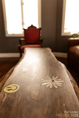 a bedroom with a bed and a television