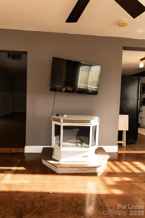 a living room with a fireplace