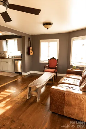 a bedroom with bed and window