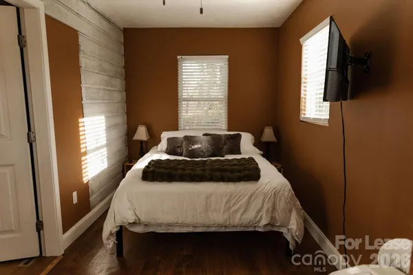 a view of a car park in front of a house