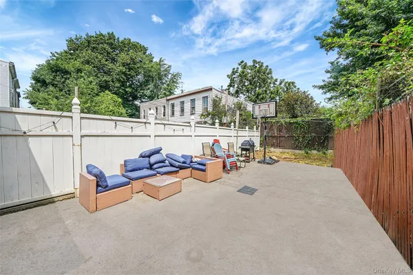 a view of a terrace with sitting area