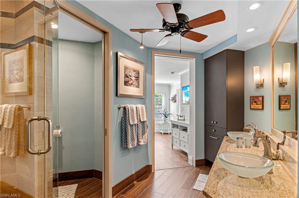 4022 Crayton Road Naples, FL 34103 - Photo 14 of 28 a view of a walk in closet