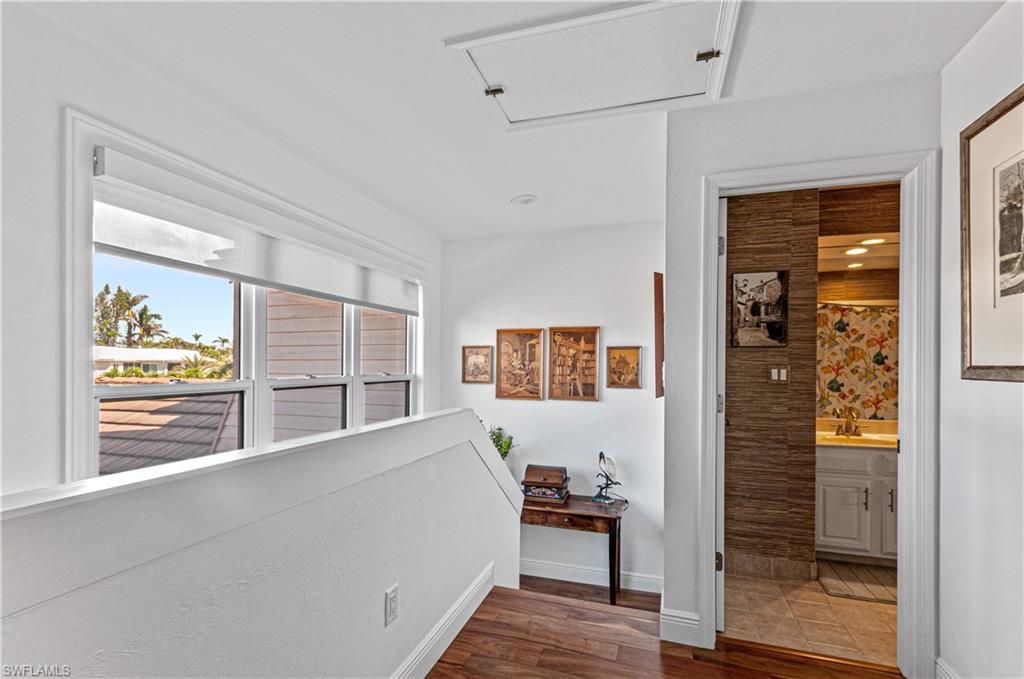 4022 Crayton Road Naples, FL 34103 - Photo 21 of 28 a room with furniture and window