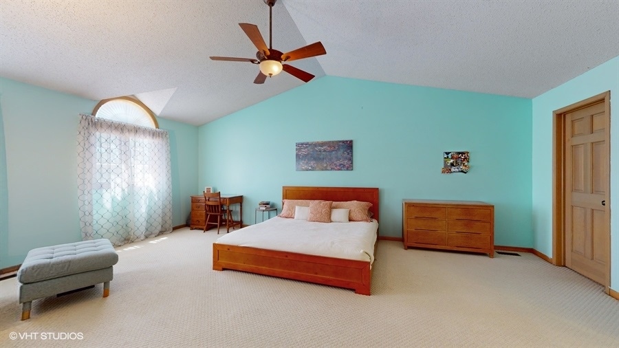 545 Abbey Road Bartlett, IL 60103 - Photo 14 of 28 a bedroom with furniture and a window