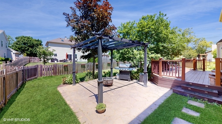 545 Abbey Road Bartlett, IL 60103 - Photo 24 of 28 a view of a backyard with sitting area