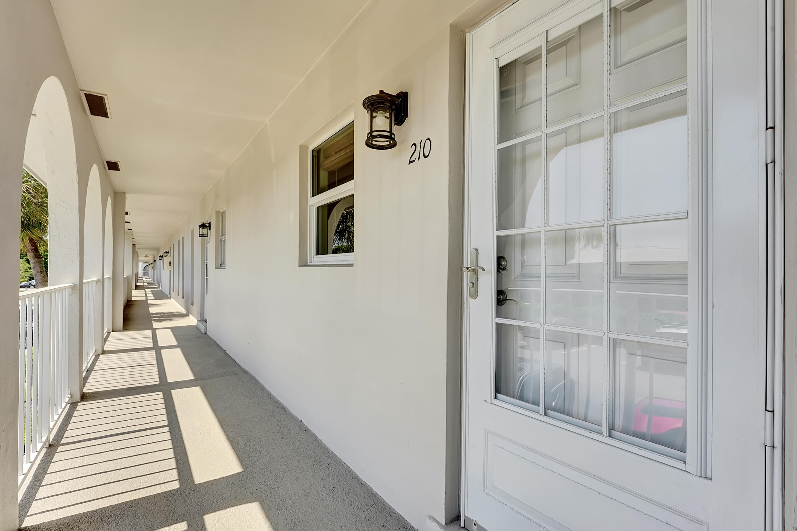 250 Northeast 20th Street, Unit 210 Boca Raton, FL 33431 - Photo 4 of 25 Entrance