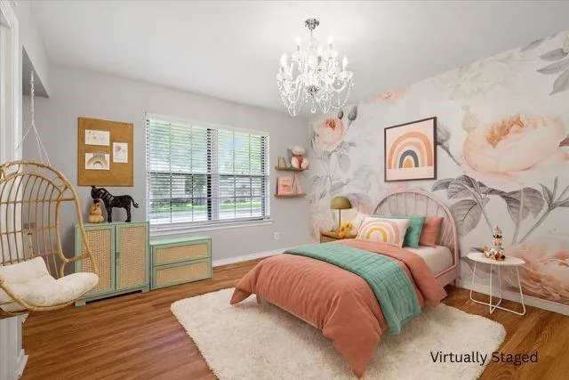 a view of a room with a ceiling fan a hardwood and a ceiling fan