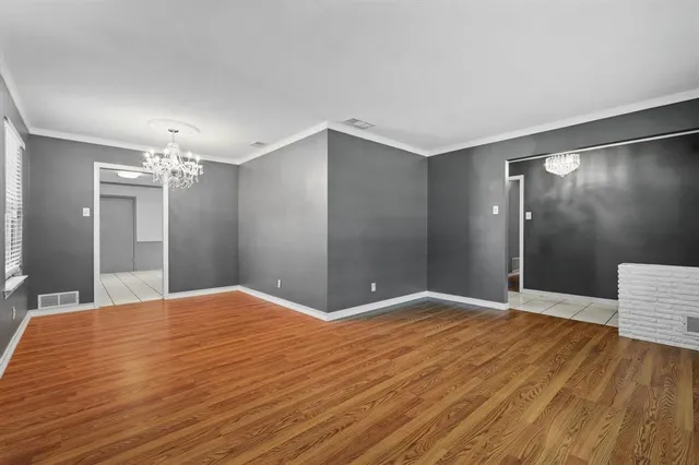 a kitchen with stainless steel appliances granite countertop a stove and a sink