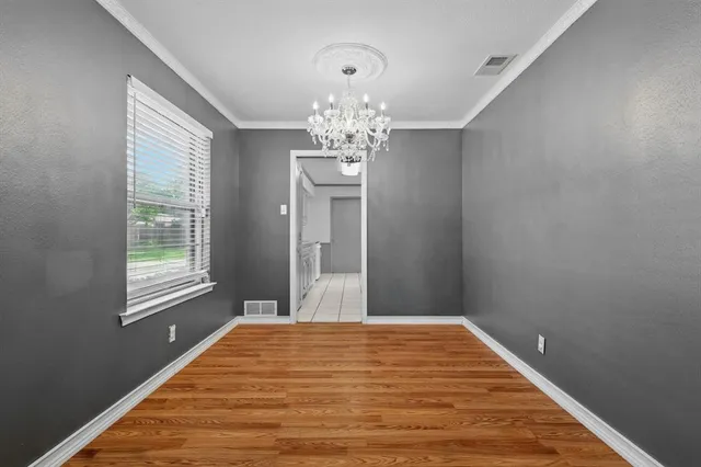a kitchen with stainless steel appliances granite countertop a stove and a sink