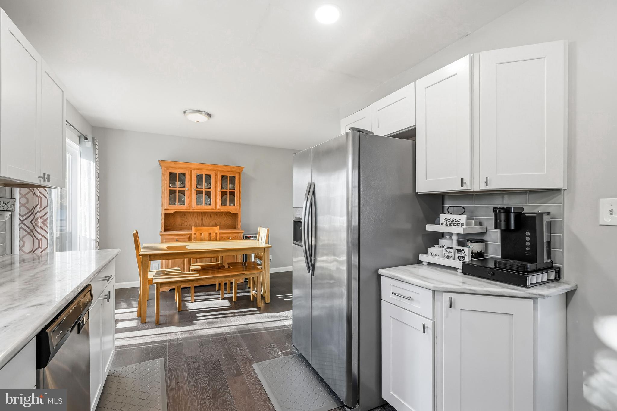 16 Sumner Avenue Berlin, NJ 08009 - Photo 14 of 30 a kitchen with stainless steel appliances a stove refrigerator and cabinets