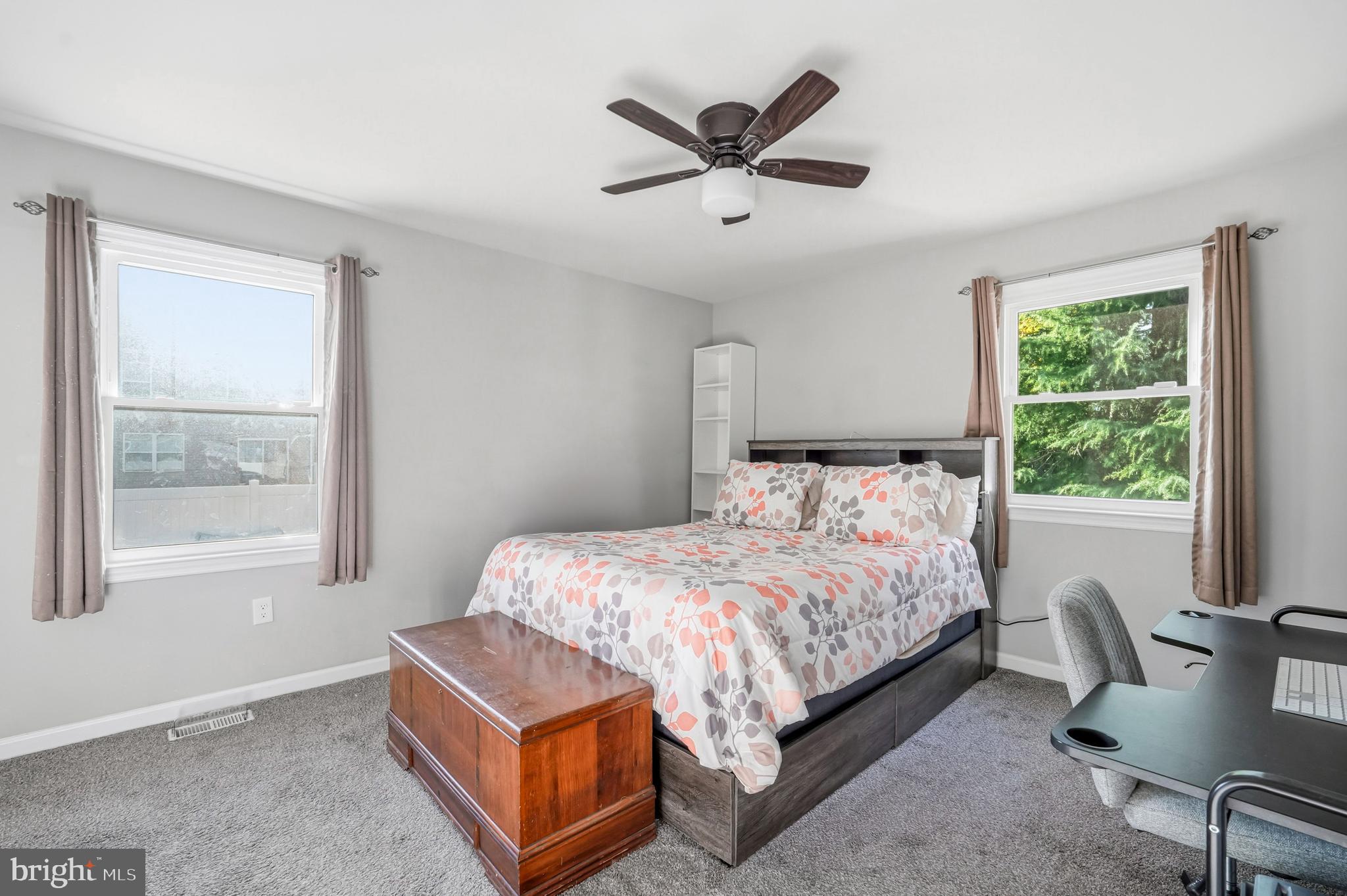 16 Sumner Avenue Berlin, NJ 08009 - Photo 20 of 30 a bedroom with a bed a window and a dresser