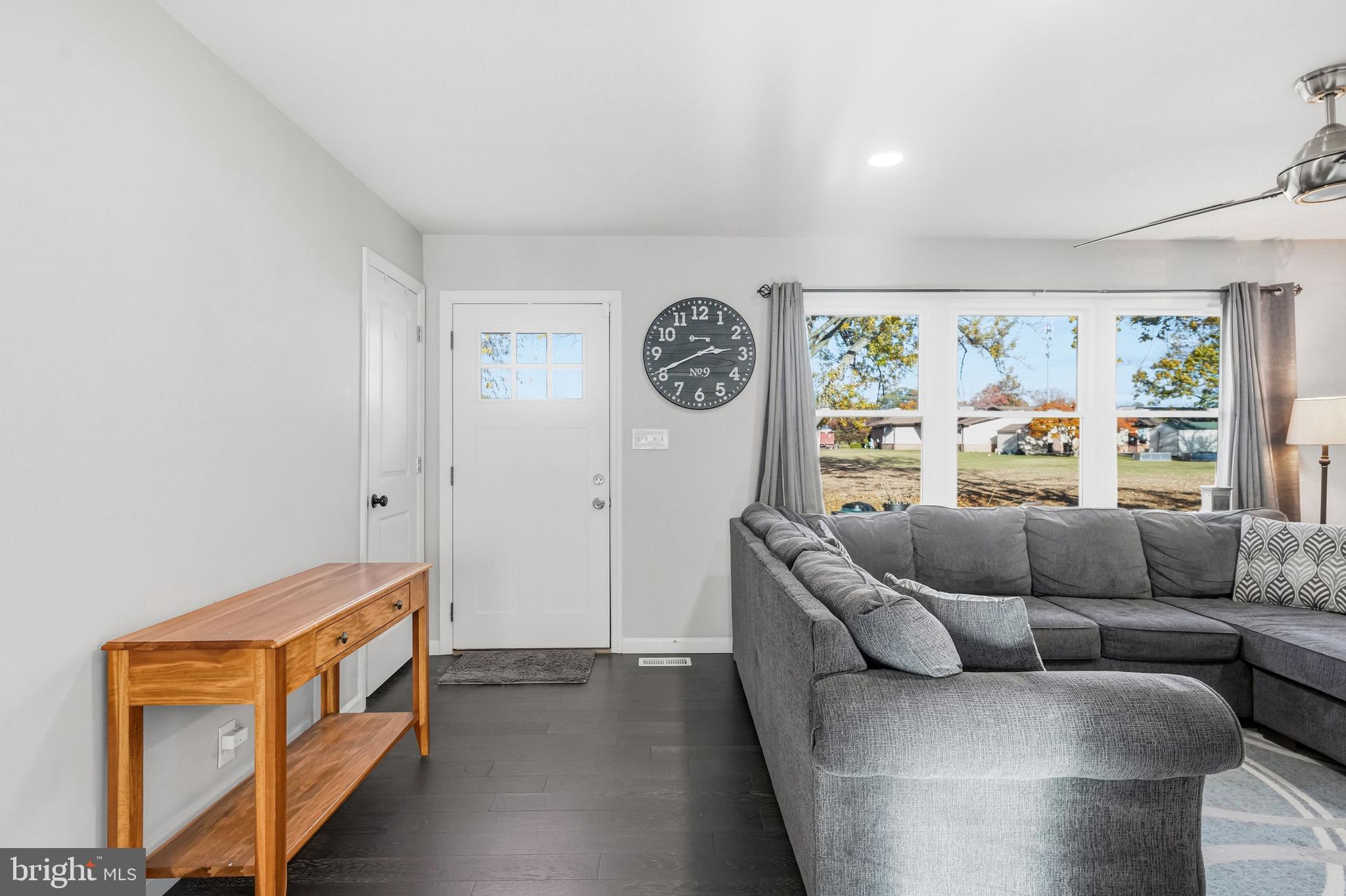 16 Sumner Avenue Berlin, NJ 08009 - Photo 3 of 30 a living room with furniture and a large window