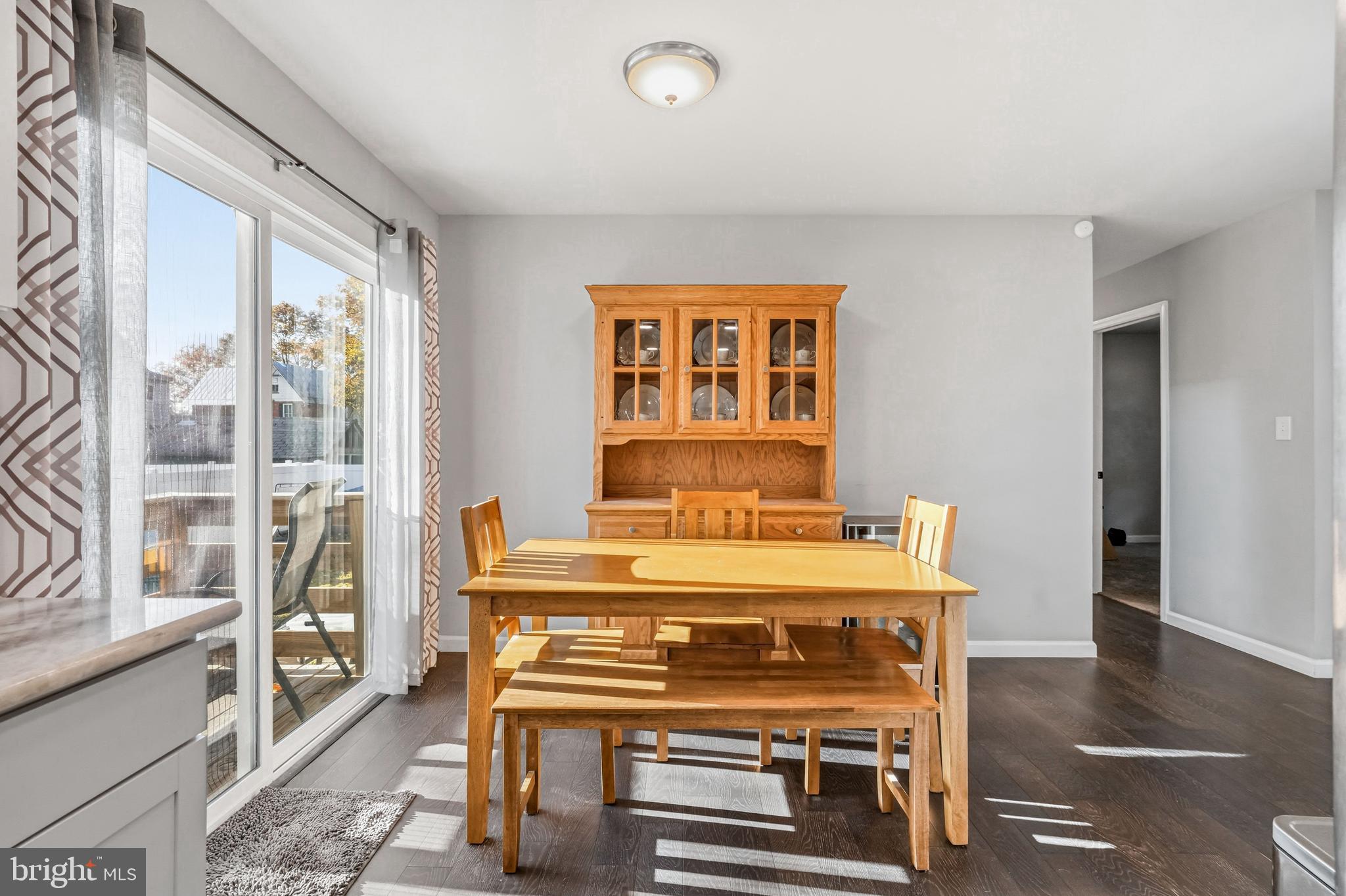 16 Sumner Avenue Berlin, NJ 08009 - Photo 9 of 30 a dining room with a furniture and large windows