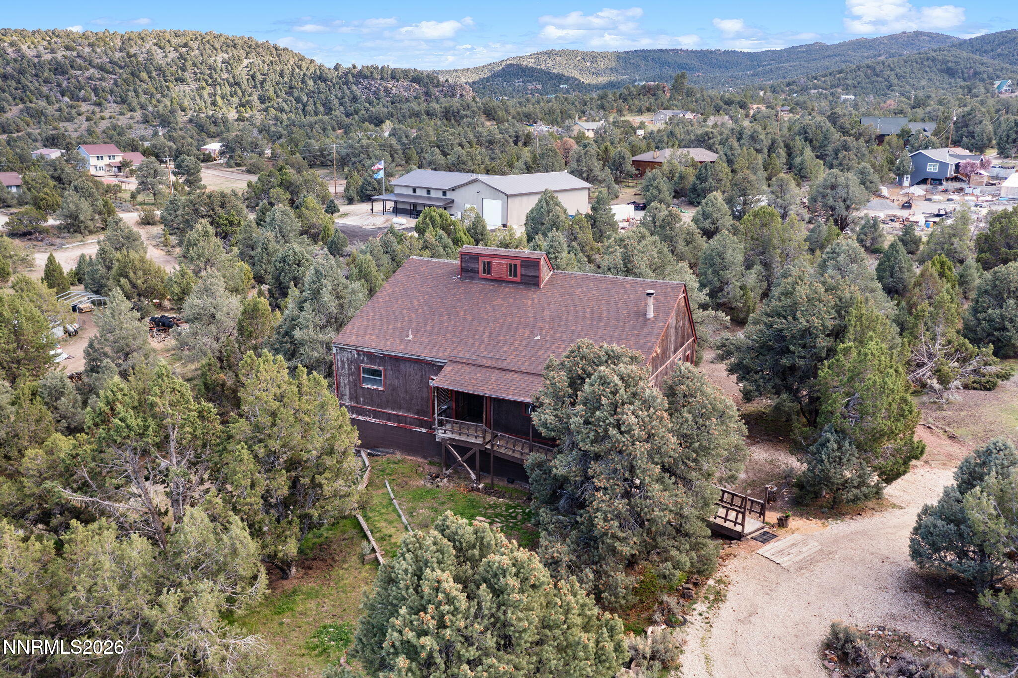 21845 Adobe Road Reno, NV 89521 - Photo 11 of 65 an aerial view of a house with a yard