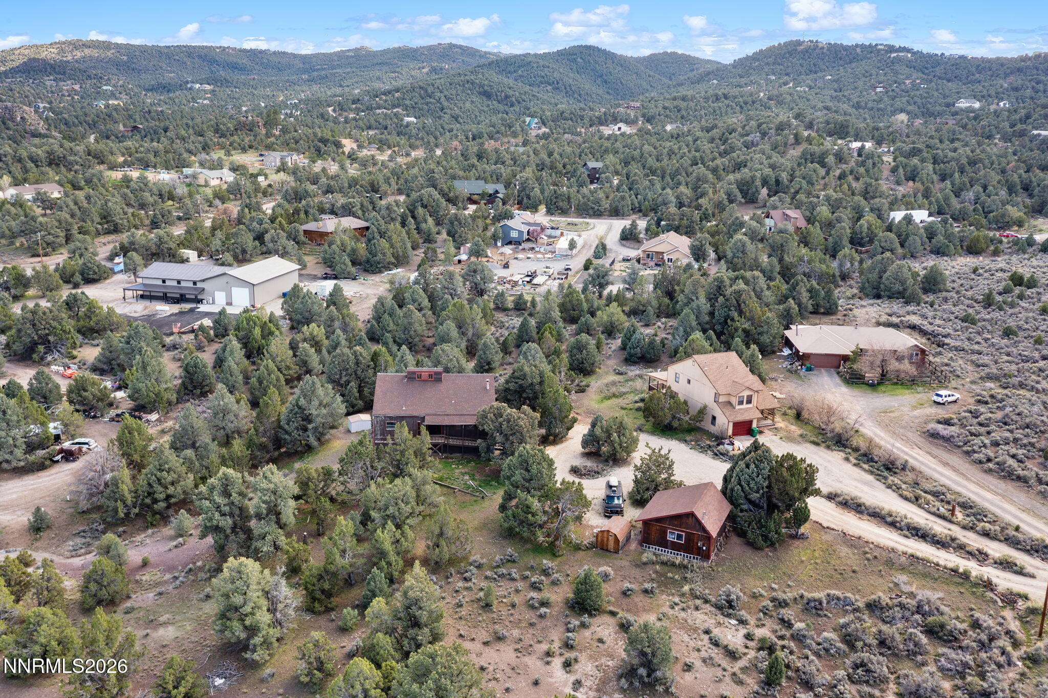 21845 Adobe Road Reno, NV 89521 - Photo 12 of 65 an aerial view of a house with a yard