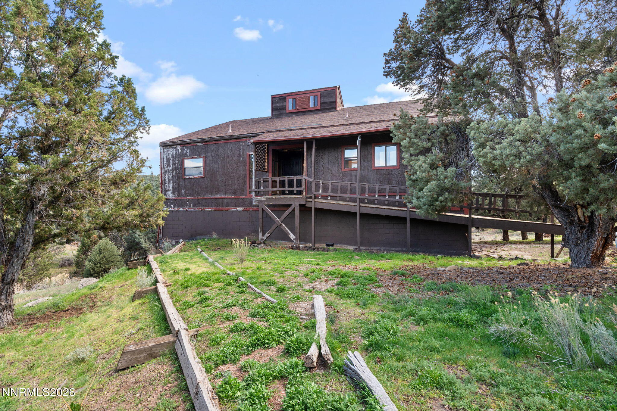 21845 Adobe Road Reno, NV 89521 - Photo 2 of 65 a view of a house with a yard
