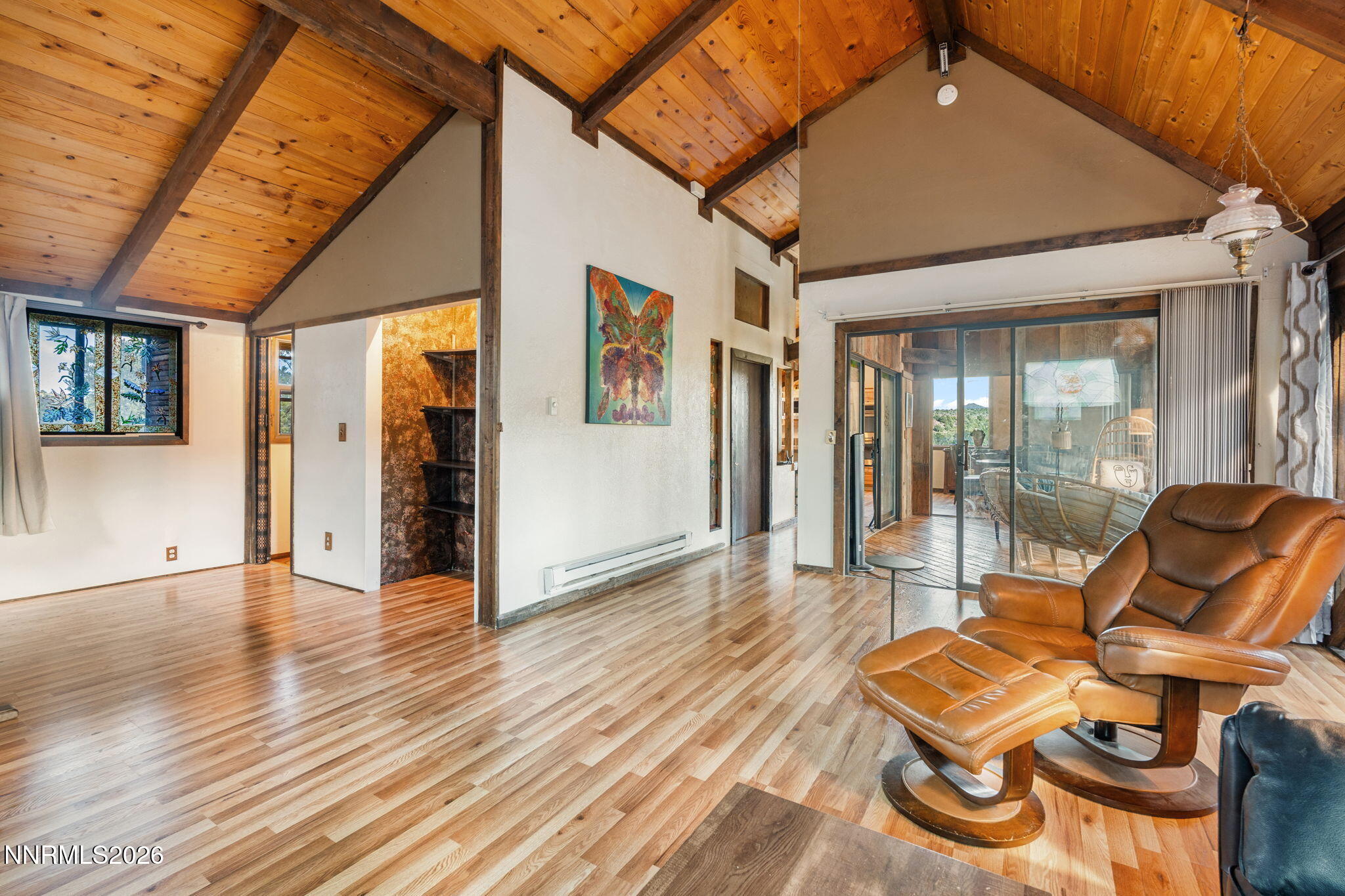 21845 Adobe Road Reno, NV 89521 - Photo 21 of 65 a view of a livingroom with wooden floor and furniture