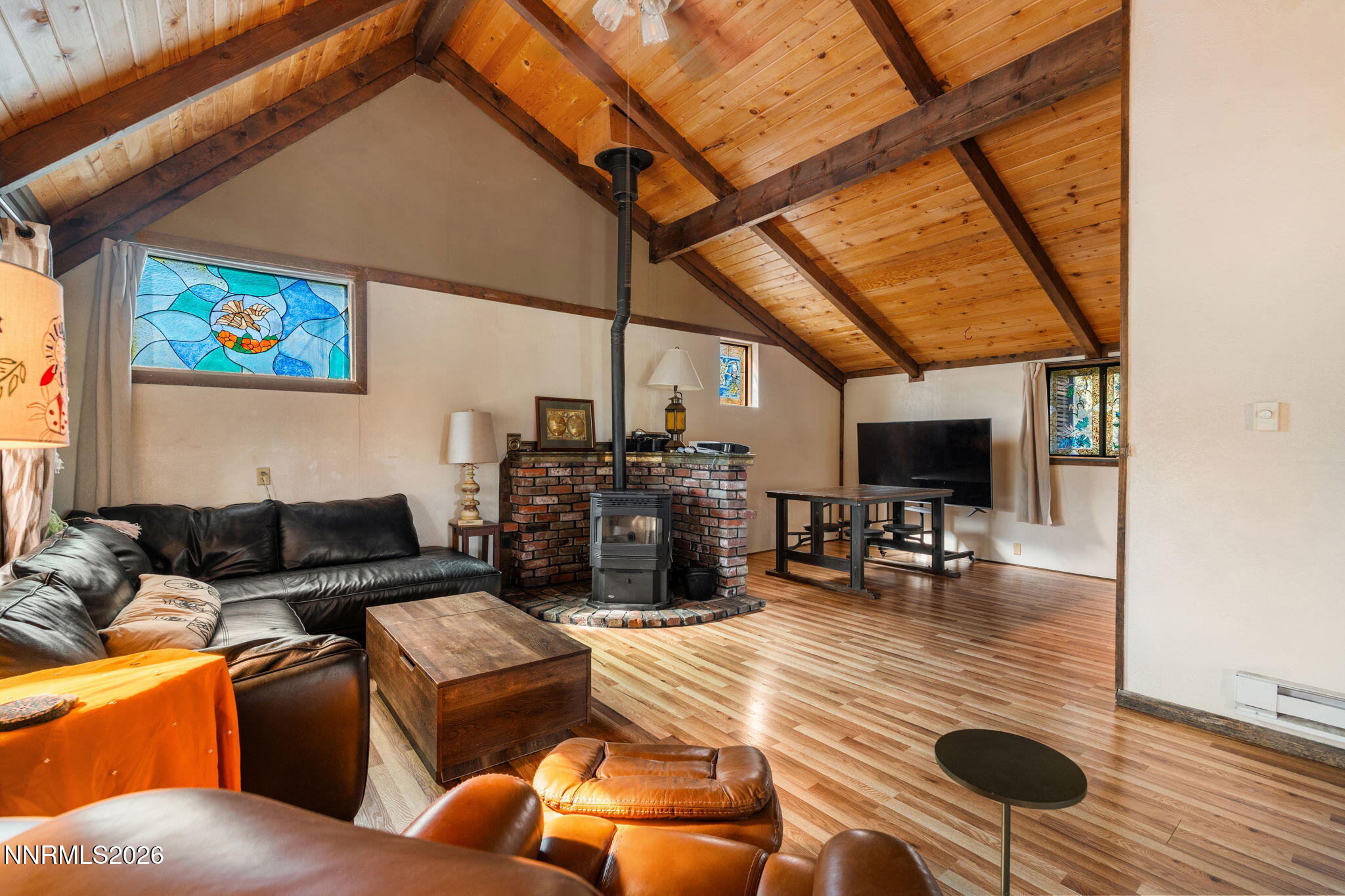 21845 Adobe Road Reno, NV 89521 - Photo 23 of 65 a living room with furniture and a flat screen tv