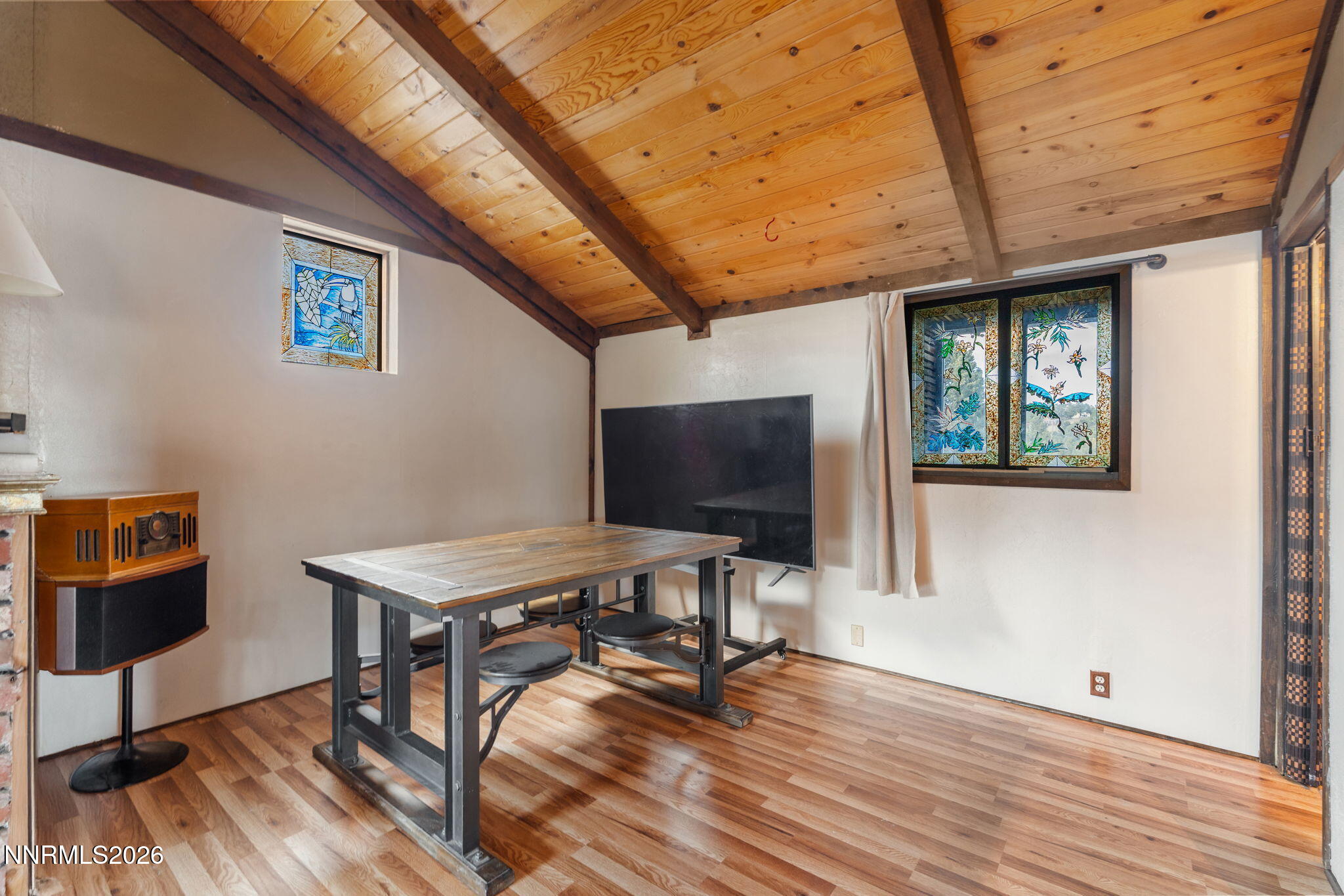 21845 Adobe Road Reno, NV 89521 - Photo 25 of 65 a living room with furniture and a flat screen tv