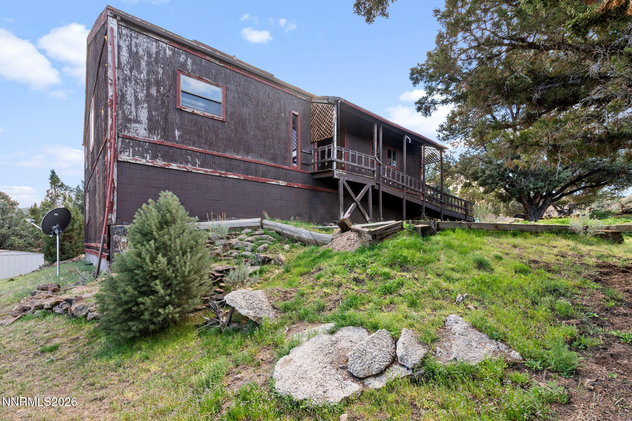21845 Adobe Road Reno, NV 89521 - Photo 3 of 65 a front view of a house with a yard