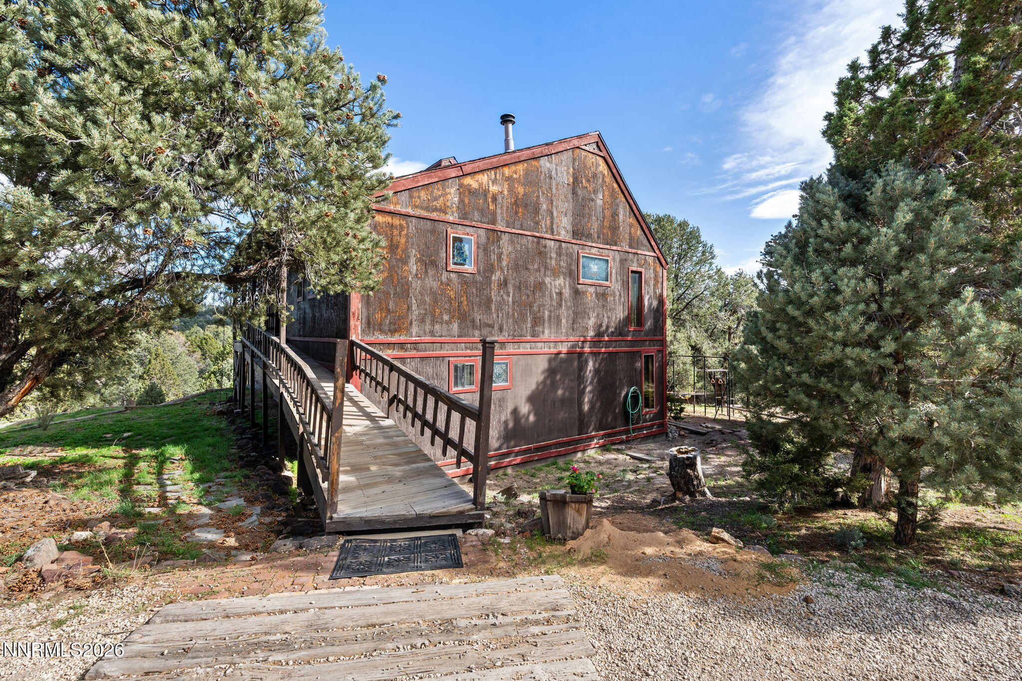 21845 Adobe Road Reno, NV 89521 - Photo 4 of 65 a view of a house with a yard
