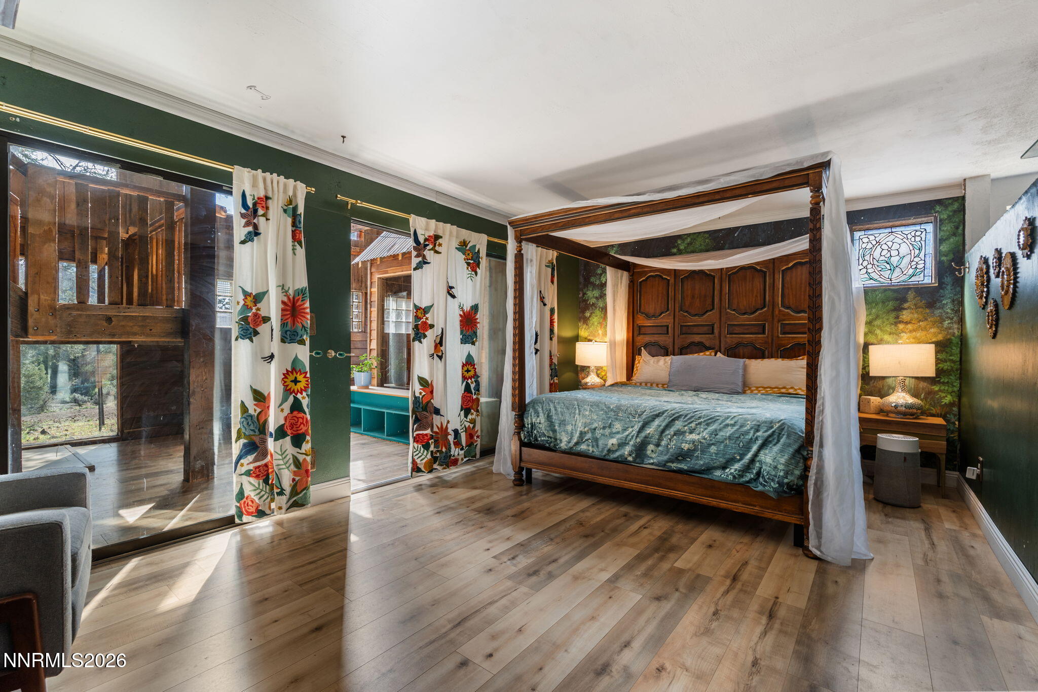 21845 Adobe Road Reno, NV 89521 - Photo 42 of 65 a bedroom with a large bed and a walk in closet